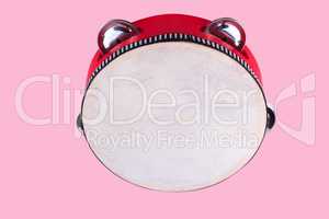 tambourine isolated on pink