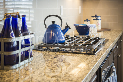 Marble Kitchen Counter and Stove With Cobalt Blue Decor