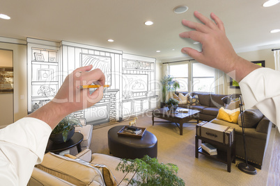 Male Hands Drawing Entertainment Center Over Photo of Home Inter