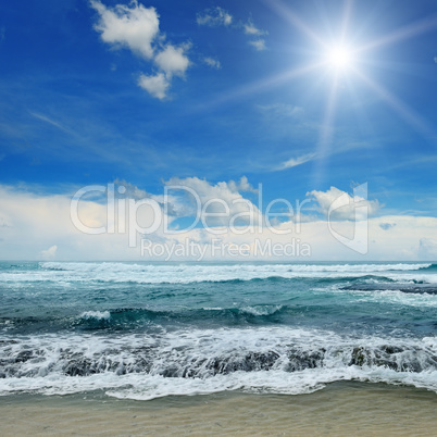 sun over sea and blue sky