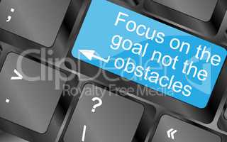 Focus on the goal not the obstacles. Computer keyboard keys with quote button. Inspirational motivational quote. Simple trendy design