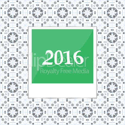2016 in instant photo frames on abstract background