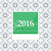 2016 in instant photo frames on abstract background