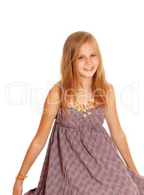 Lovely little girl sitting on floor.