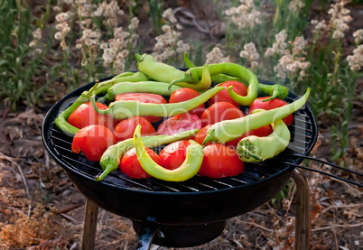 Tomato and Peppers Fish Grilling On BBQ
