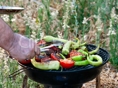 Tomato and Peppers Fish Grilling On BBQ