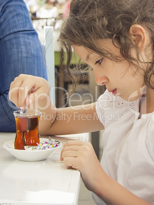 Little Girl Drinking Turkish Tea