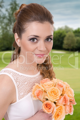 Beautiful bride with roses