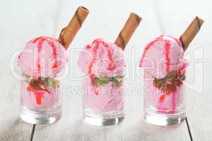 Cups of strawberry ice cream