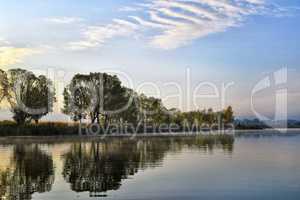 Water landscape with clouds reflection