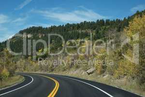 an empty american road in colorado , usa