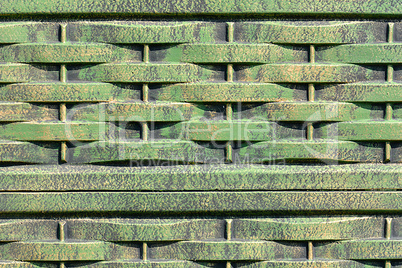 Old rusty green corrugated metal wall