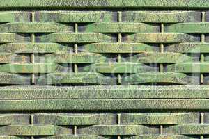 Old rusty green corrugated metal wall