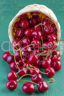 Fresh cherries on wood