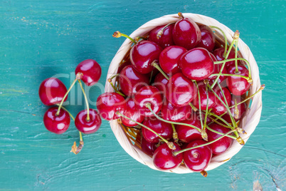 Fresh cherries on wood