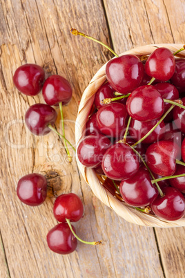 Fresh cherries on wood