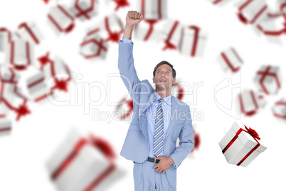 Composite image of full length of businessman with hand raised