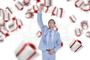 Composite image of full length of businessman with hand raised