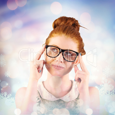 Composite image of hipster redhead looking up thinking