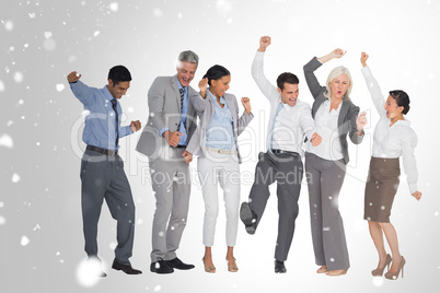 Composite image of business people cheering in office