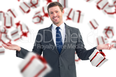 Composite image of happy businessman with hands out