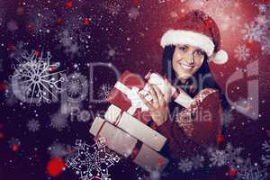 Composite image of young brunette with many christmas presents