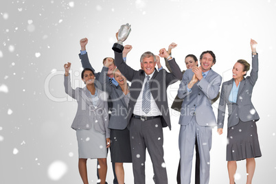 Composite image of excited business team cheering at camera with