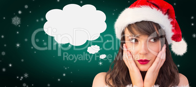 Composite image of pretty santa girl with hands on face