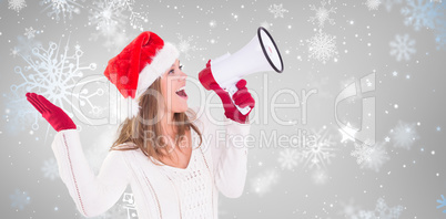 Composite image of festive blonde shouting through megaphone