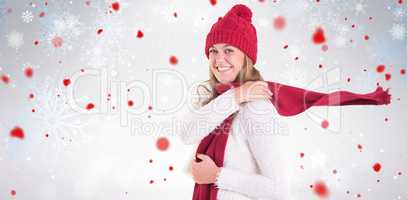 Composite image of happy blonde in winter clothes