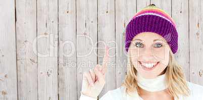 Composite image of positive woman showing up smiling at the came