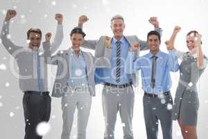 Composite image of business people cheering in office