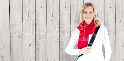Composite image of portrait of a delighted student with scarf sm