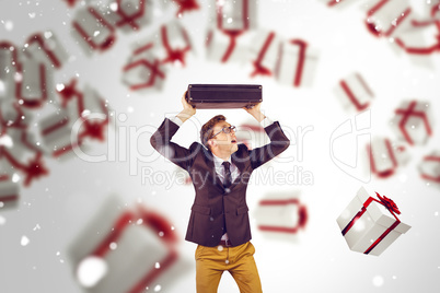 Composite image of young geeky businessman holding briefcase