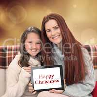 Composite image of mother and daughter showing tablet