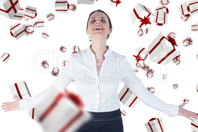 Composite image of businesswoman standing arms outstretched on w