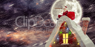 Composite image of santa sitting on roof of cottage