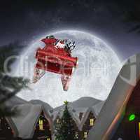 Composite image of santa flying his sleigh