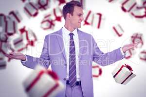 Composite image of businessman with hands out