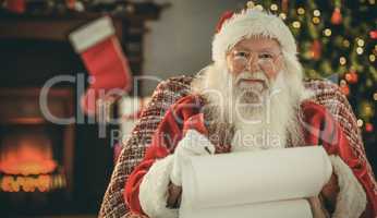 Happy santa writing list with a quill