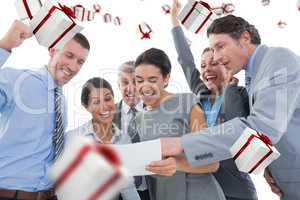 Composite image of business team celebrating a new contract