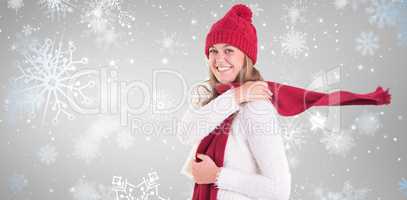 Composite image of happy blonde in winter clothes