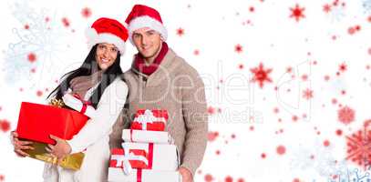 Composite image of young couple with many christmas presents