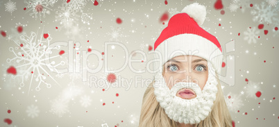 Composite image of funny girl in santa beard