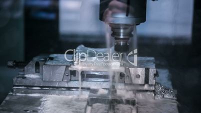 Metalworking CNC milling machine. Cutting metal modern processing technology.