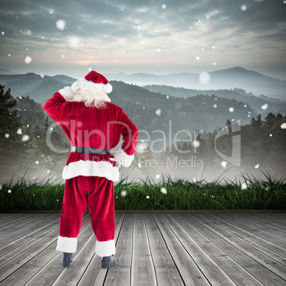 Composite image of santa scratching his head