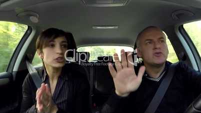 Angry Husband And Wife Having An Argument Traveling By Car