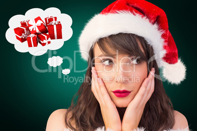 Composite image of pretty santa girl with hands on face