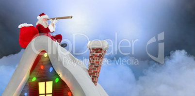 Composite image of santa sitting on roof of cottage