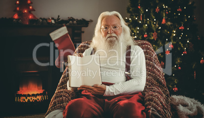 Santa claus showing his book